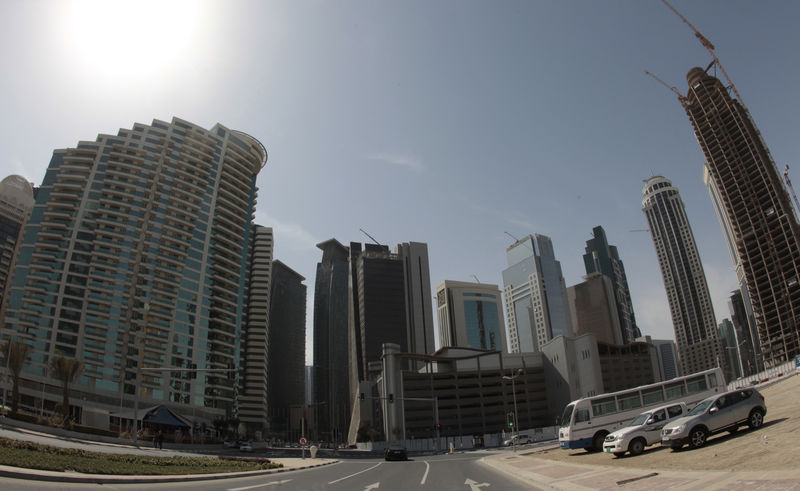 © Reuters. Buildings and skyscrapers are seen in Doha