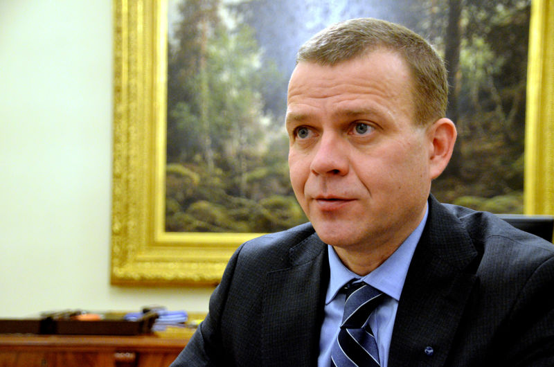 © Reuters. FILE PHOTO: FinlandÕs Finance Minister Orpo listens to the media in Helsinki