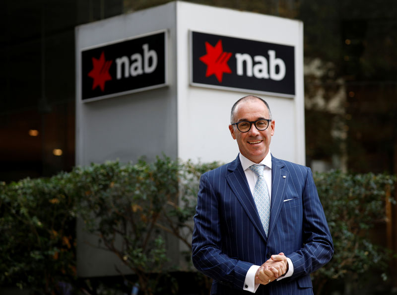 © Reuters. NAB Group CEO Andrew Thorburn poses for a photocall outside their office in Sydney