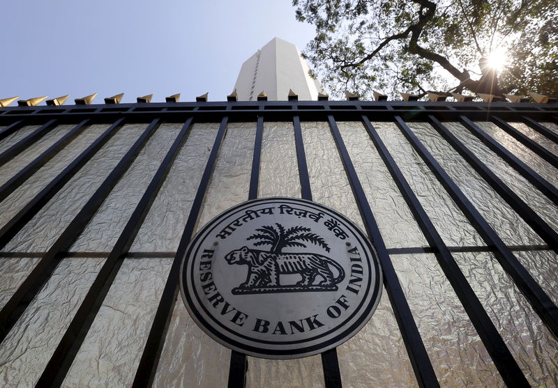 © Reuters. The {{0|Reserve Bank of India}} (RBI) seal is pictured on a gate outside the RBI headquarters in Mumbai