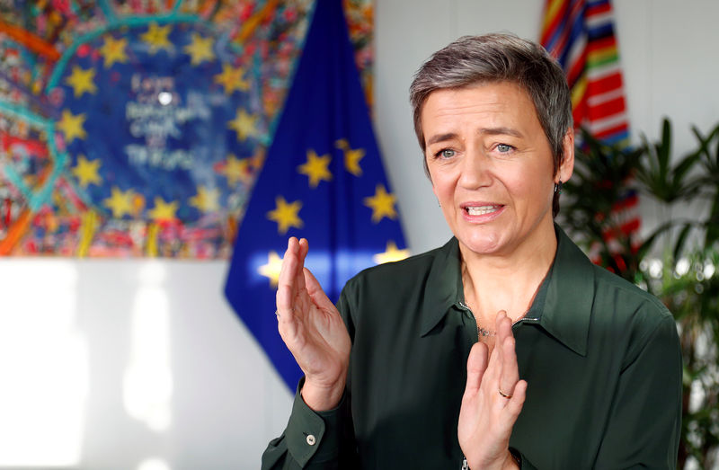 © Reuters. FILE PHOTO - EU Competition Commissioner Margrethe Vestager speaks during an interview with Reuters at the EU Commission headquarters in Brussels