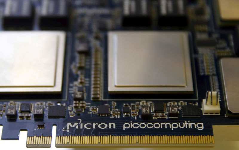 © Reuters. Memory chip parts of U.S. memory chip maker MicronTechnology are pictured at their fair booth at an industrial fair in Frankfurt