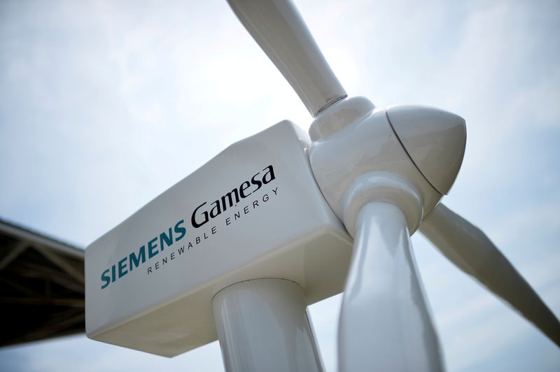 © Reuters. A model of a wind turbine with the Siemens Gamesa logo is displayed outside the annual general shareholders meeting in Zamudio