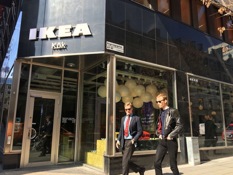 © Reuters. People walk past an IKEA kitchen showroom downtown Stockholm