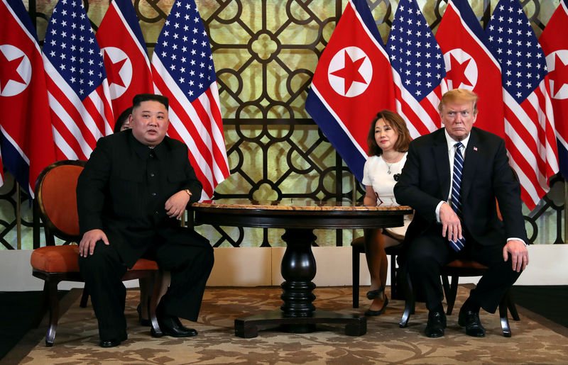 © Reuters. FILE PHOTO: North Korean leader Kim Jong Un and U.S. President Donald Trump listen to questions from the media during the one-on-one bilateral meeting at the second North Korea-U.S. summit in the Metropole hotel in Hanoi