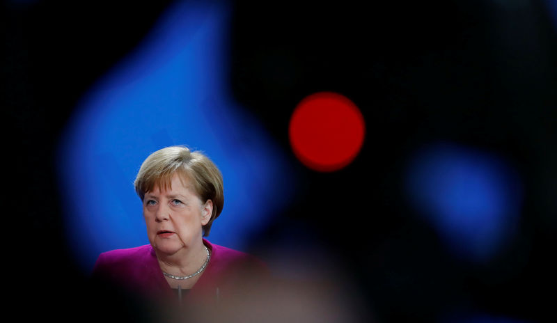 © Reuters. German Chancellor Angela Merkel addresses a news conference in Berlin