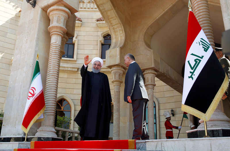 © Reuters. Presidente do Irã, Hassan Rouhani, durante visita ao Palácio Salam, em Bagdá, no Iraque