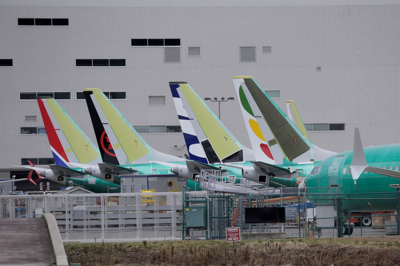 © Reuters. FILE PHOTO: The tails of Boeing 737 MAX aircraft are seen at a Boeing production facility in Renton, Washington