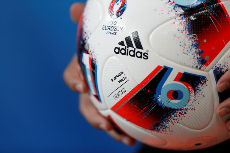 © Reuters. FILE PHOTO: Adidas logo on a football at Euro 2016 semi final in Lyon, France
