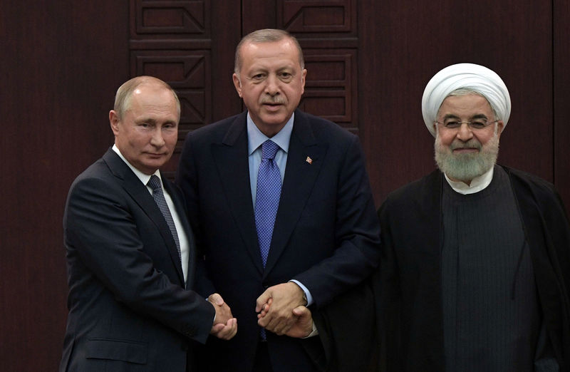 © Reuters. تركيا وروسيا وإيران تتفق على خطوات لتهدئة التوتر في إدلب السورية رغم الخلافات