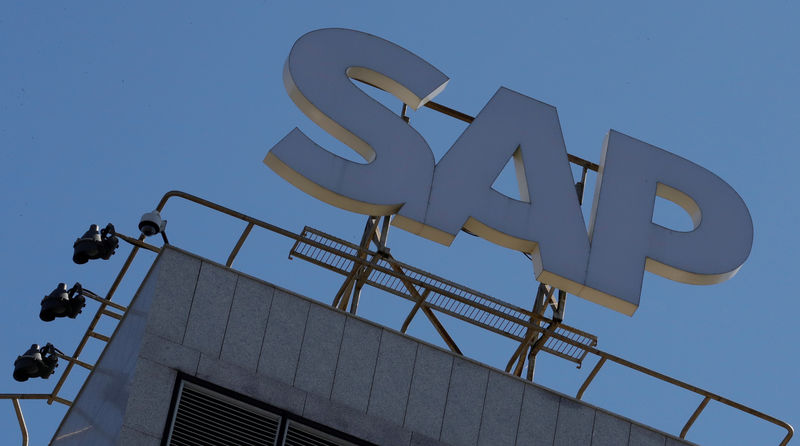 © Reuters. FILE PHOTO: A view shows a sign with the logo of SAP software company on the roof of an office building in Moscow