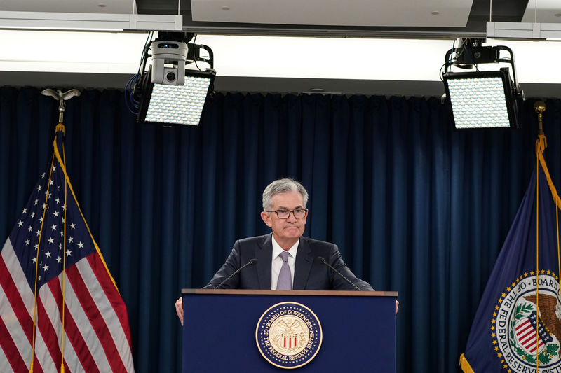 Fed cuts interest rates, signals holding pattern for now