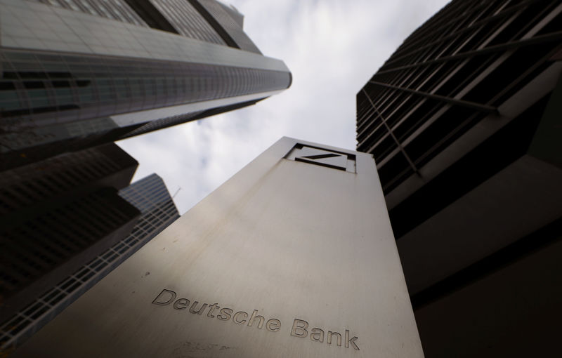 © Reuters. FILE PHOTO: The logo of Deutsche Bank is seen in front of one of the bank's office buildings in Frankfurt