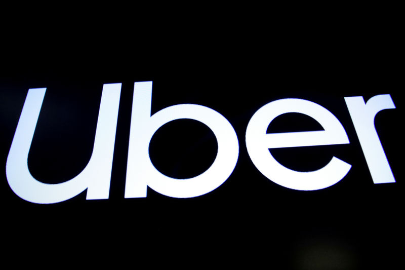© Reuters. FILE PHOTO: A screen displays the company logo for Uber Technologies Inc. on the day of its IPO at the NYSE in New York