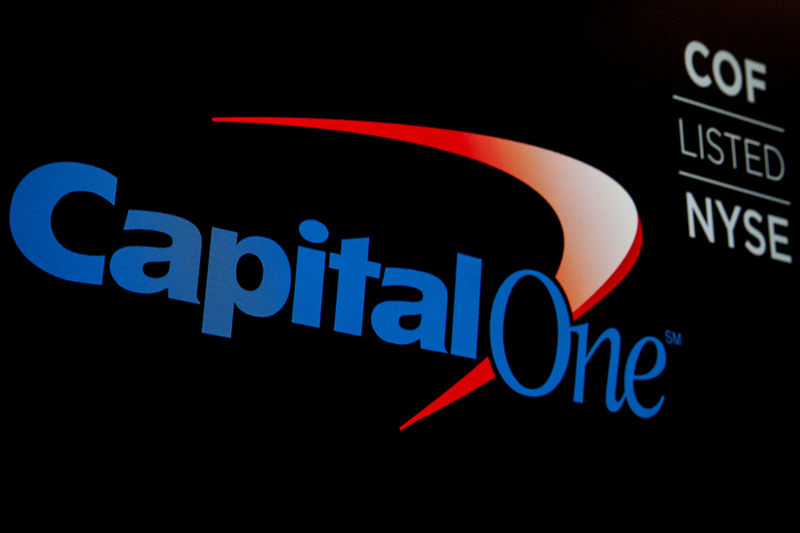 © Reuters. FILE PHOTO - The logo and ticker for Capital One are displayed on a screen on the floor of the NYSE in New York