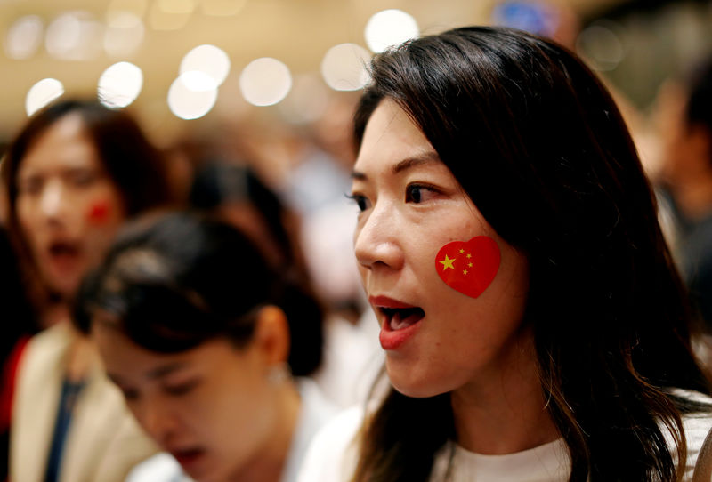 Hong Kong leader says police under extreme pressure; acknowledges 'long road' ahead