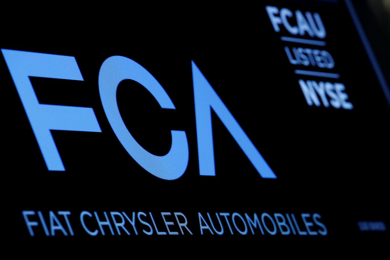 © Reuters. FILE PHOTO: A screen displays the ticker information for Fiat Chrysler Automobiles NV at the post where it's traded on the floorof the NYSE