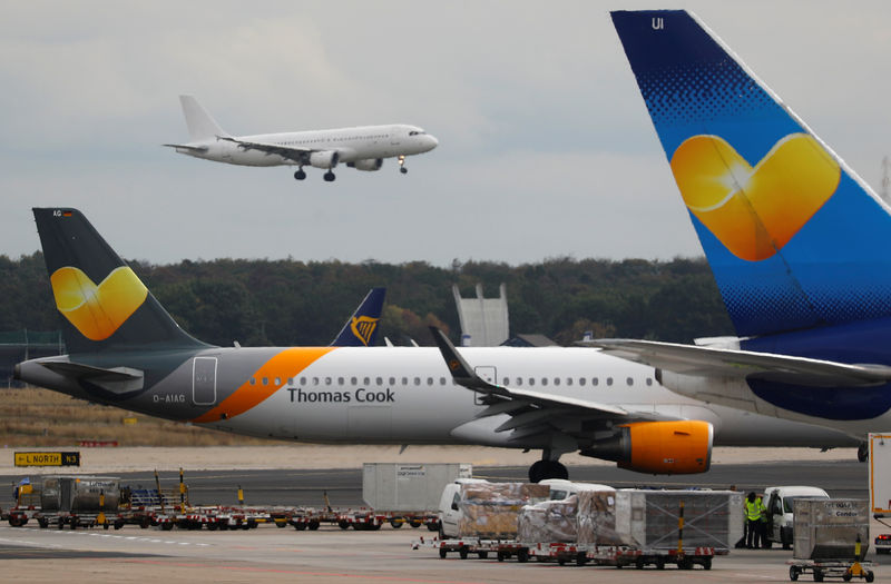 © Reuters. Airplanes with the logos of air carrier Condor by Thomas Cook are seen at the airport  in Frankfurt