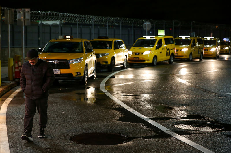 Regulator approves NYC area airport tax, favoring taxis over ride-hails