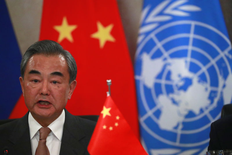 © Reuters. Wang Yi hosts lunch with counterparts from United States, Britain, Russia and France, the permanent five veto-wielding members of the U.N. Security Council.