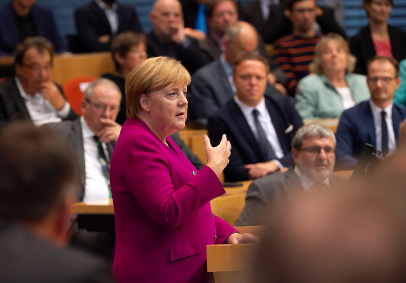 Merkel's conservatives lose support, SPD allies gain - poll