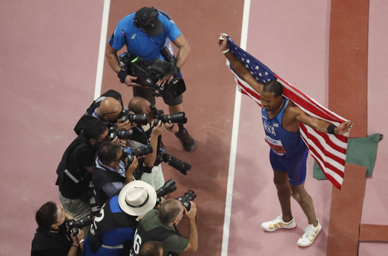 Athletics: Taylor claims fourth triple jump world title after shaky start