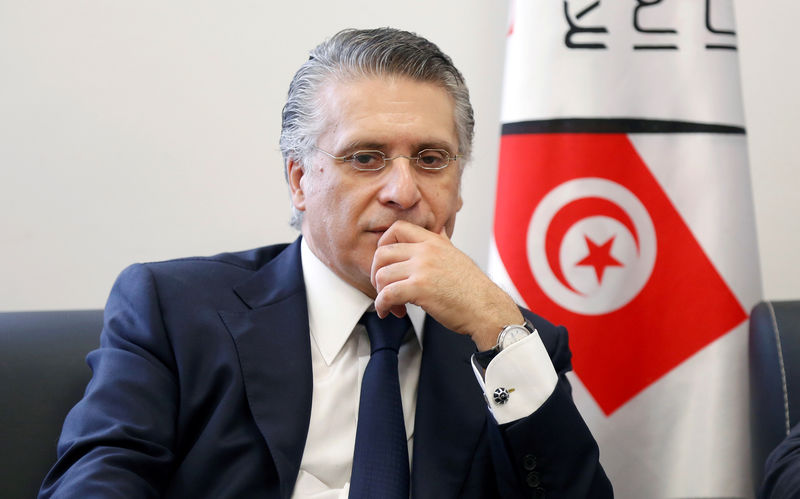 © Reuters. المتحدث باسم نبيل القروي يقول إنه تأهل لجولة الإعادة في انتخابات الرئاسة التونسية