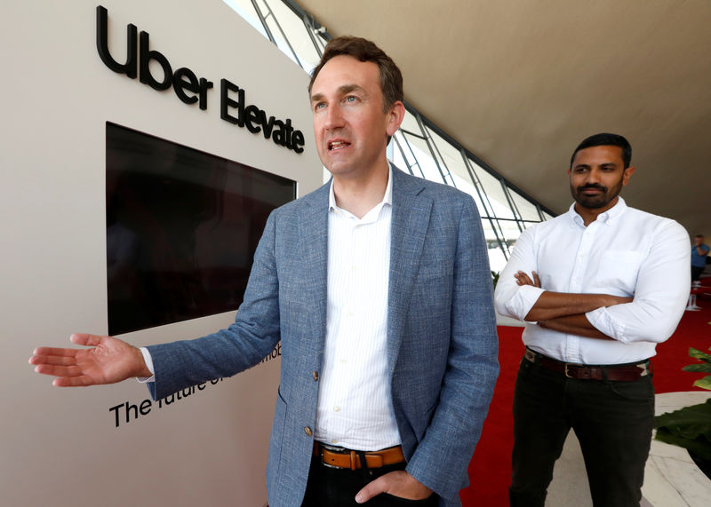 © Reuters. Eric Allison, Head of Uber Elevate, and Anil Nathan, General Manager of Aviation are seen during an interview with Reuters at New York's JFK International Airport in New York