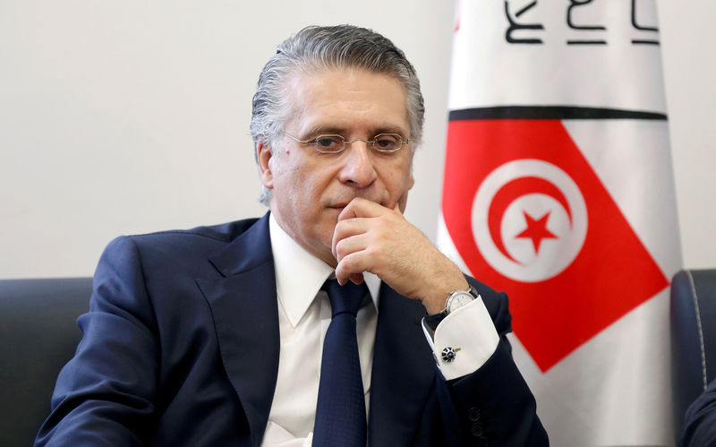 © Reuters. FILE PHOTO: Nabil Karoui, businessman and owner of the private channel Nessma TV,  submits his candidacy for the presidential election in Tunis