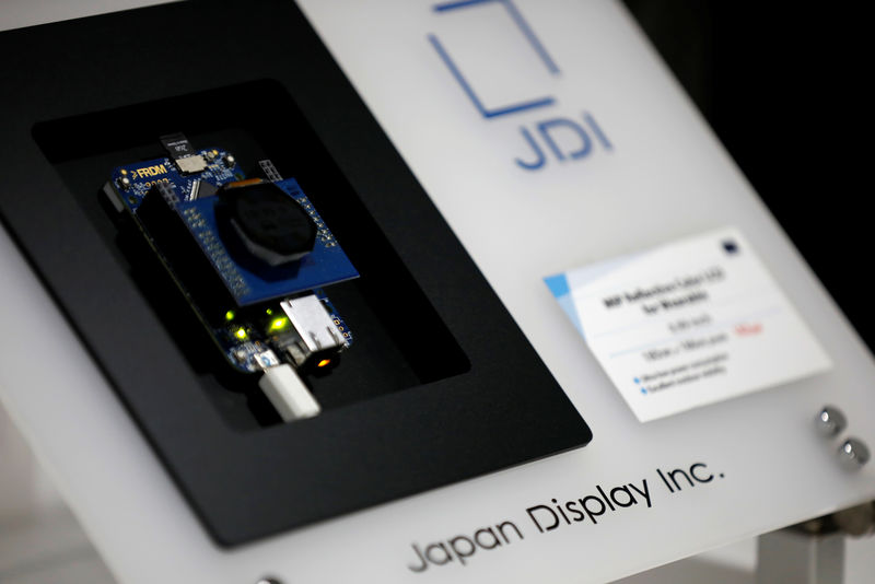 © Reuters. Japan Display's logo is seen at a display of its products at its headquarters in Tokyo