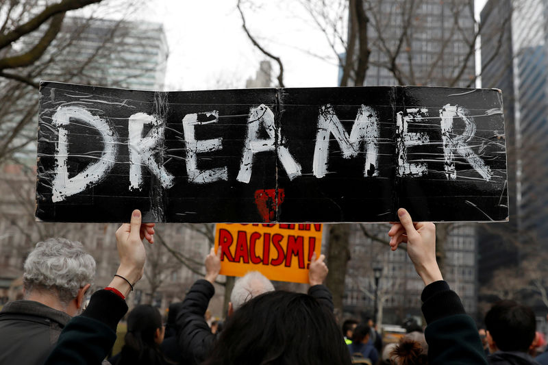 © Reuters. FILE PHOTO: Activists and DACA recipients march up Broadway during the start of their 'Walk to Stay Home,' a five-day 250-mile walk from New York to Washington D.C., to demand that Congress pass a Clean Dream Act, in Manhattan, New York