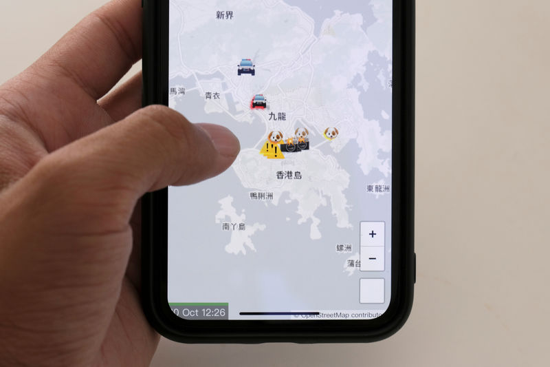 © Reuters. 米アップルＣＥＯ、香港デモ隊使用の地図アプリ削除の正当性主張