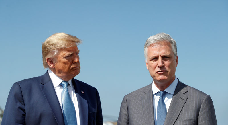 © Reuters. FILE PHOTO: U.S. President Trump faces reporters with new national security adviser O'Brien at Los Angeles International Airport in Los Angeles California