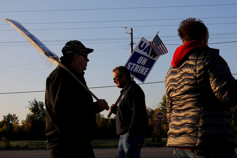 GM appeals directly to employees as strike losses mount, riling UAW