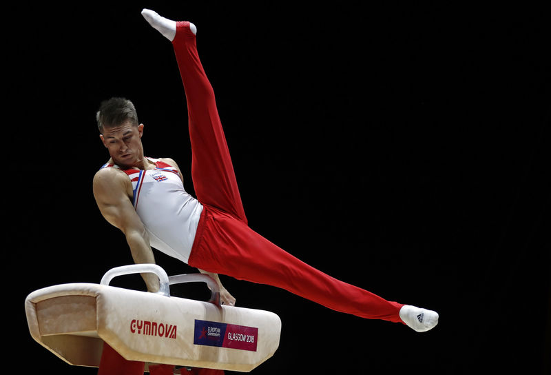 Gymnastics: Britain's Whitlock captures third pommel horse world title