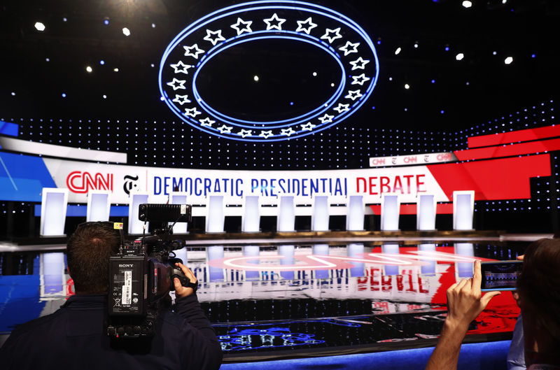 © Reuters. The 12 candidates podiums stand ready before the fourth U.S. Democratic presidential candidates 2020 election debate in Westerville, Ohio