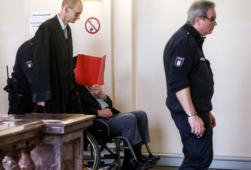 © Reuters. The 93-year-old German Bruno D. leaves after first day of his trial in Hamburg