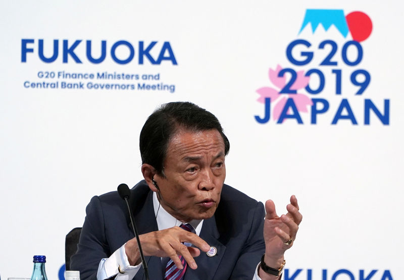 Japan finance minister signals readiness to ramp up stimulus to fight risks