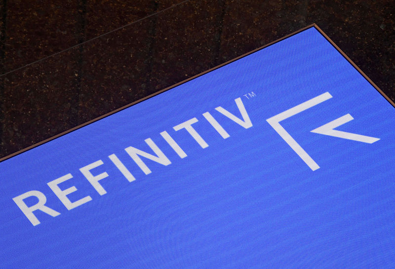 © Reuters. FILE PHOTO: The Refinitiv logo is seen on a screen in offices in Canary Wharf in London