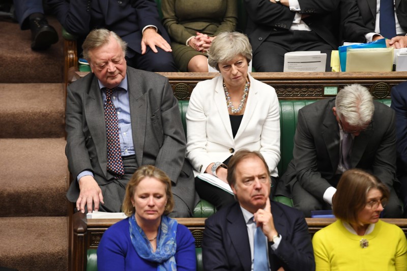 © Reuters. La diputada conservadora y exprimera ministra de Reino Unido, Theresa May, en el Parlamento británico en Londres