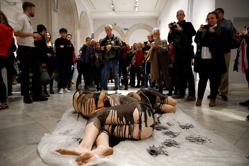 A crude performance: Semi-naked climate activists protest BP art sponsorship