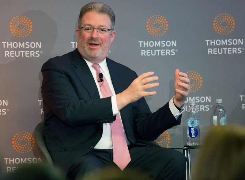 © Reuters. FILE PHOTO: Thomson Reuters Chief Executive Jim Smith speaks about the deal with Blackstone Group in Toronto