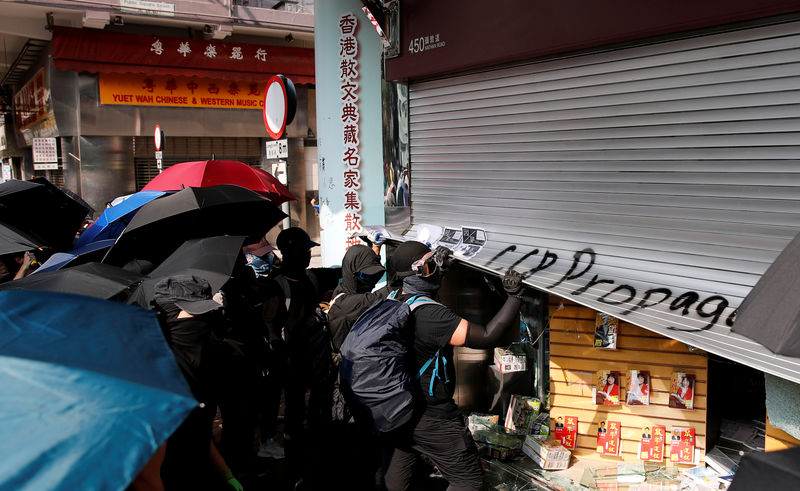 Hong Kong firms, lacking riot insurance, pick up pieces from protest damage