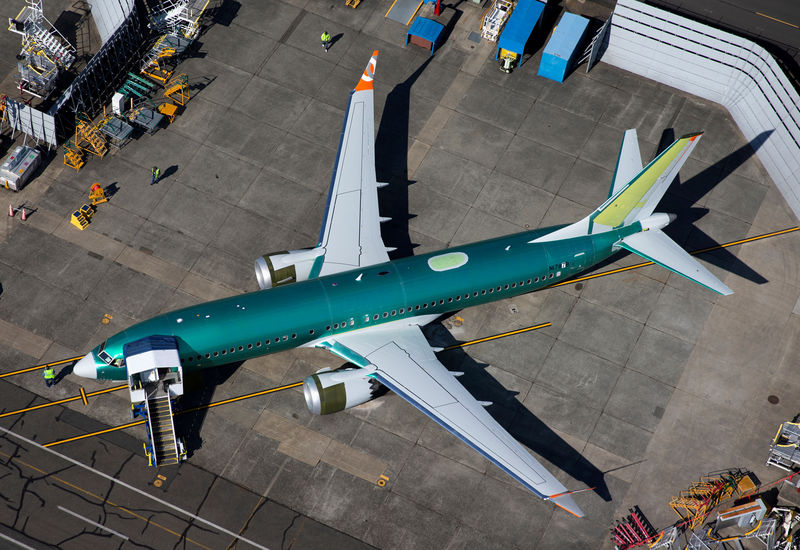 © Reuters. FILE PHOTO: An unpainted Boeing 737 MAX aircraft is seen parked in an aerial photo at Renton Municipal Airport near the Boeing Renton facility in Renton