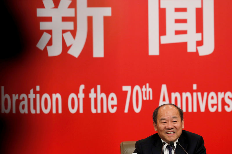 © Reuters. FILE PHOTO: NDRC Vice Chairman Ning Jizhe attends a news conference on China's economic development ahead of the 70th anniversary of its founding, in Beijing