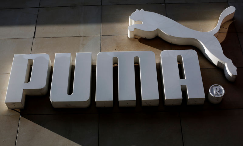 © Reuters. The logo of German sports goods firm Puma is seen at the entrance of one of its stores in Vienna