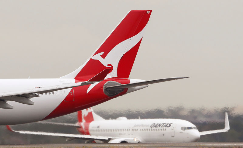Australia's Qantas reports dip in domestic demand; shares slide