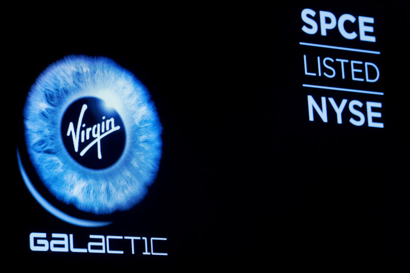 © Reuters. Virgin Galactic (SPCE) logo is displayed on a screen on the floor of the NYSE in New York