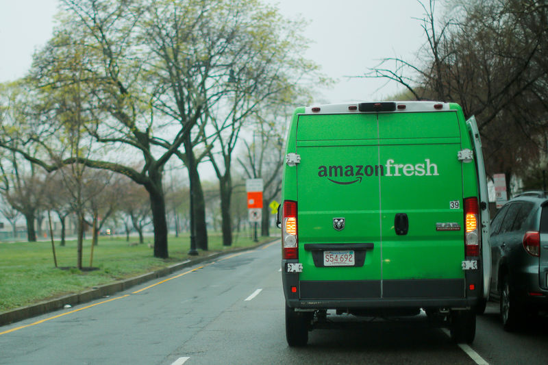 © Reuters. FILE PHOTO: An Amazon Fresh truck makes a delivery in Cambridge