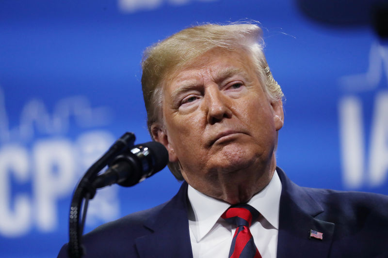 © Reuters. FILE PHOTO: U.S. President Trump attends International Association of Chiefs of Police annual conference and expo in Chicago